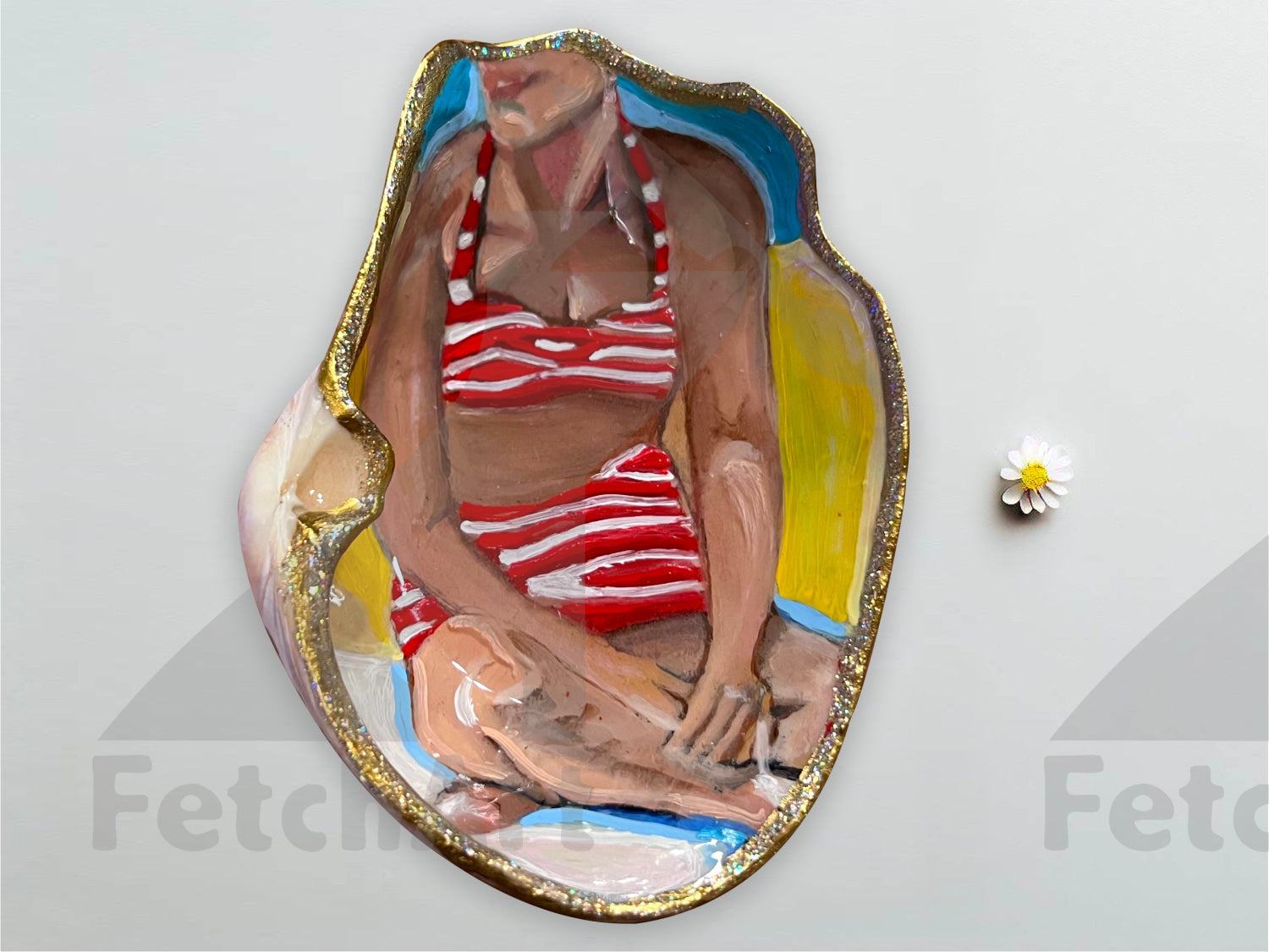 Large Sea Shell woman sitting on the beach