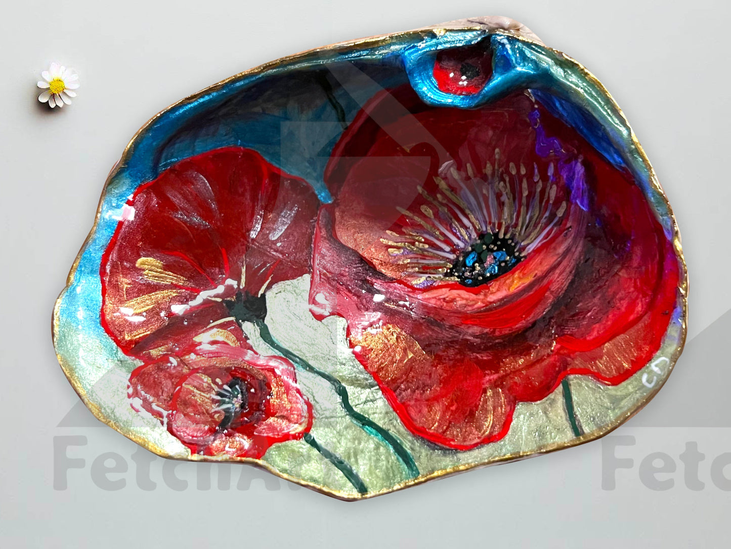 red flowers painting on large seashell